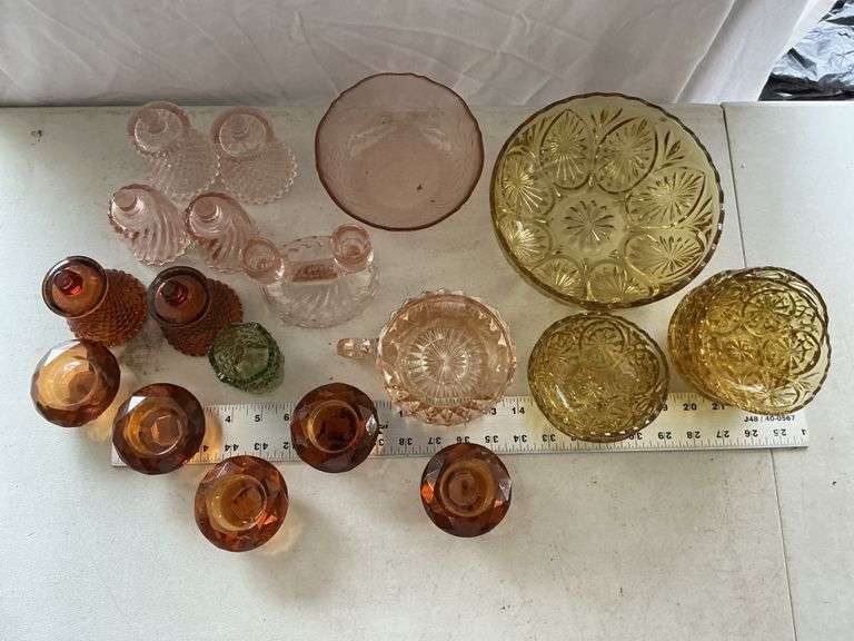 Colored glassware bowls, votive candle holders,