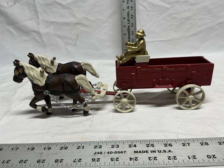 Cast iron horses and wagon