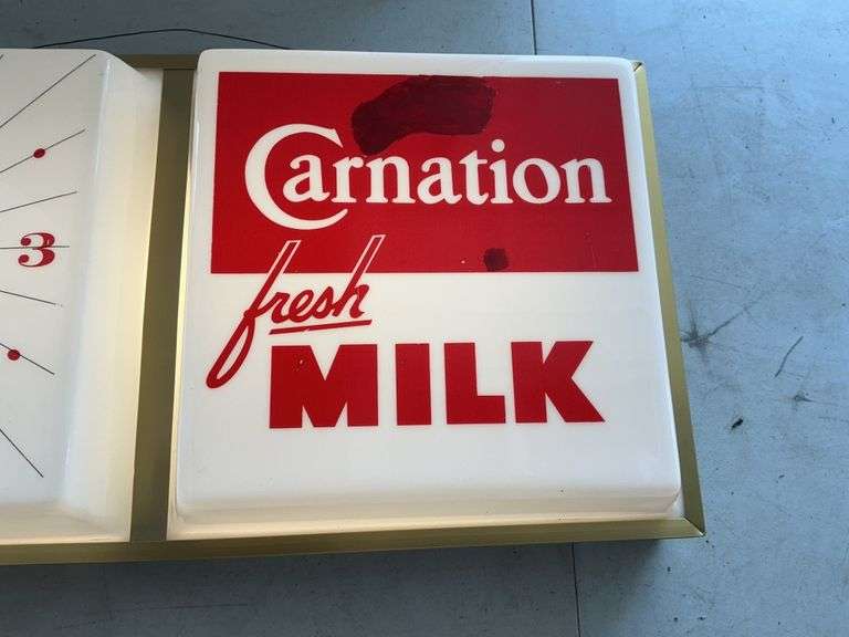 Lighted Carnation clock-lights up/has been