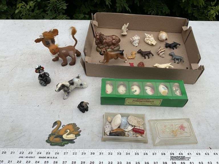 Seashells, dog figurines, decorative eggs etc.