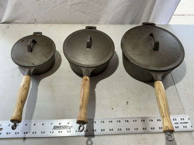 One, two & 3 quart Cast-iron pans with lids
