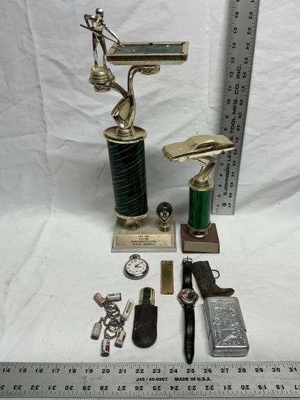 Trophies, pocket watch, lighters, Taz watch, etc.