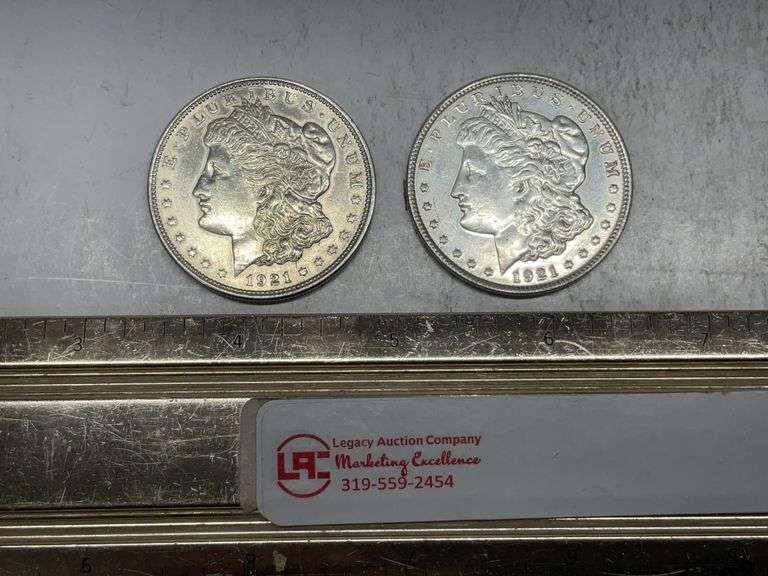 2- 1921 Morgan silver dollars