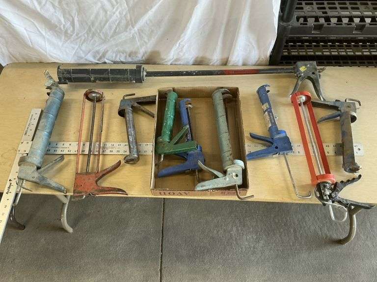 Caulk guns