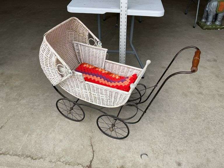 Antique wicker doll buggy