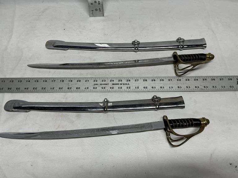 (2) heavy decorative swords