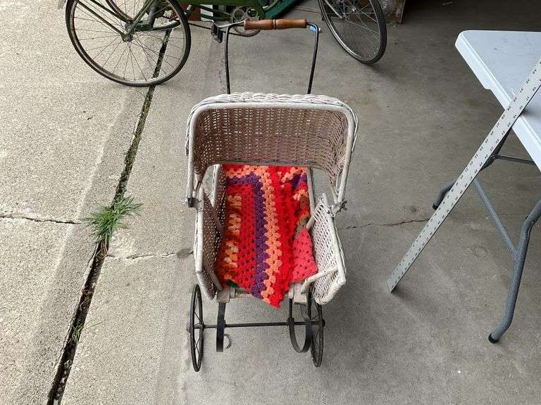 Antique wicker doll buggy