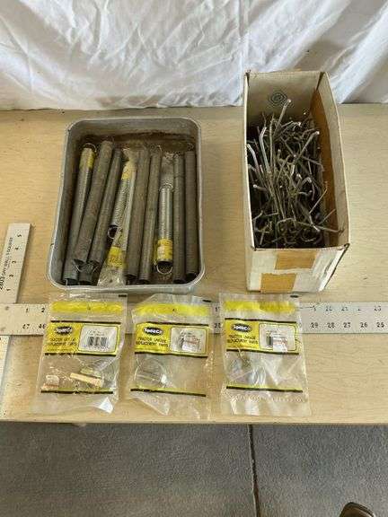 Pegboard hooks and springs