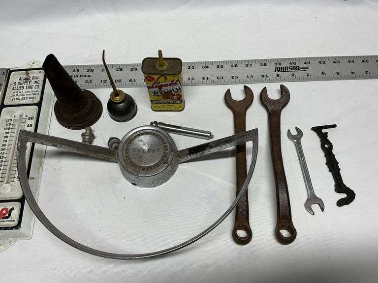 Steering wheel, thermometers, oil cans, wrenches