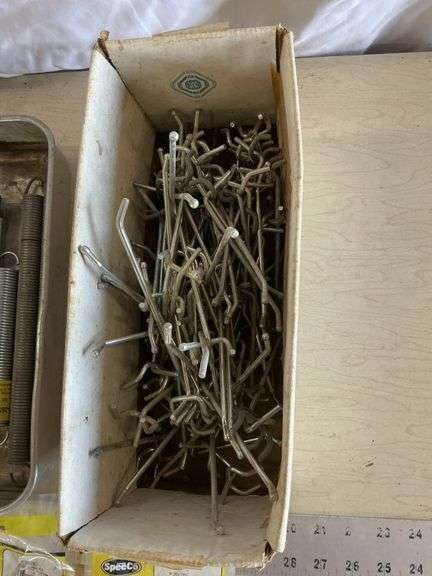Pegboard hooks and springs