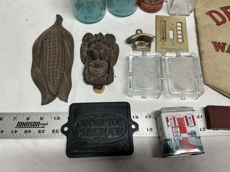 Water bag, jars, cast iron pieces, level, etc
