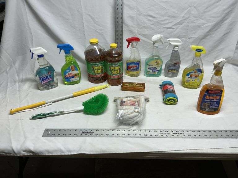 Partial containers of cleaner and microfiber