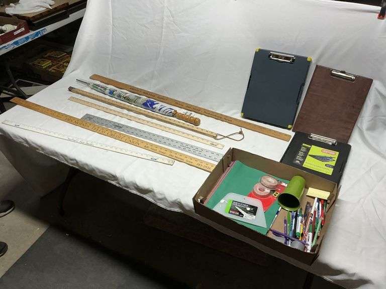 Measuring sticks/clipboards and pens and pencils