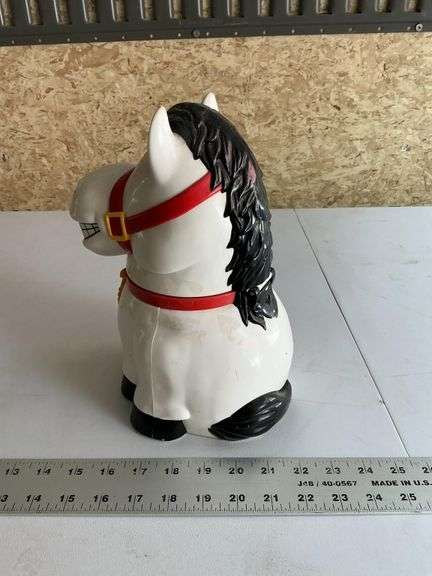 Plastic battery operated cow cookie jar