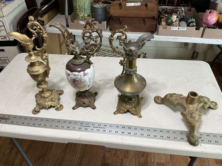 Cast-iron base and heavy decorative pitchers