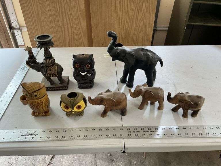 Elephant and owl figurines