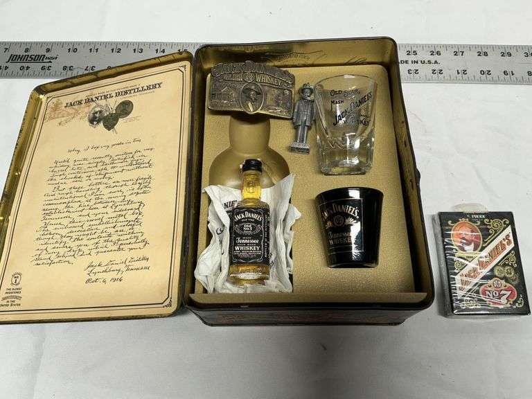 Jack Daniels shot glasses, belt buckle etc.