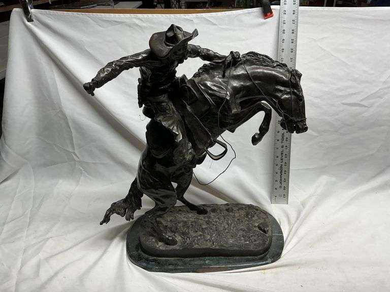 Frederic Remington cowboy with horse statue