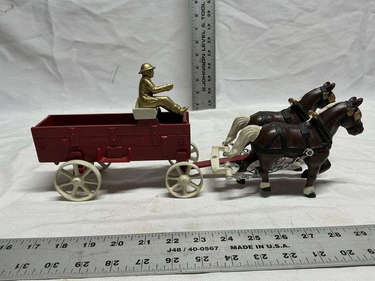 Cast iron horses and wagon
