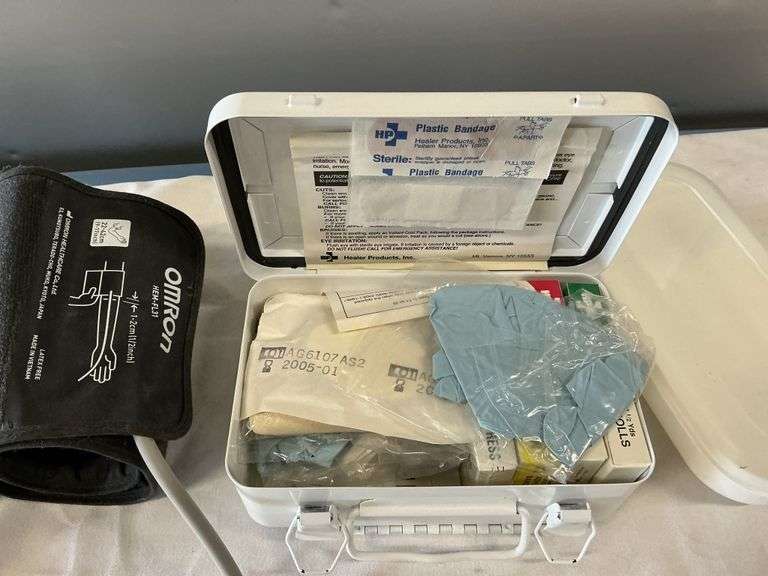 Blood pressure monitor and first aid kit