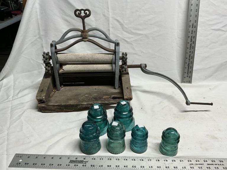 Insulators, antique wringer