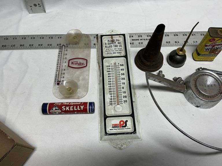 Steering wheel, thermometers, oil cans, wrenches