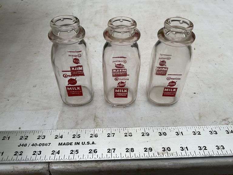 3- Carnation half pint milk bottles