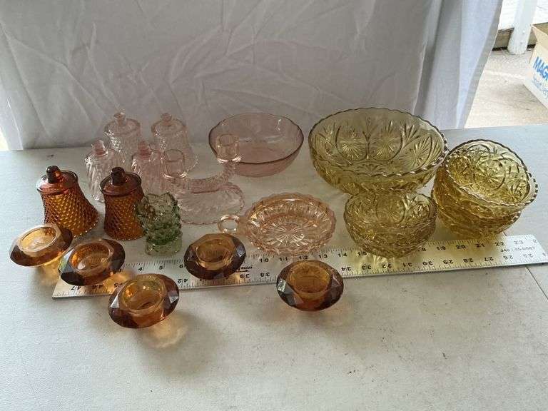 Colored glassware bowls, votive candle holders,