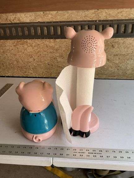Plastic pig cookie jar and towel holder