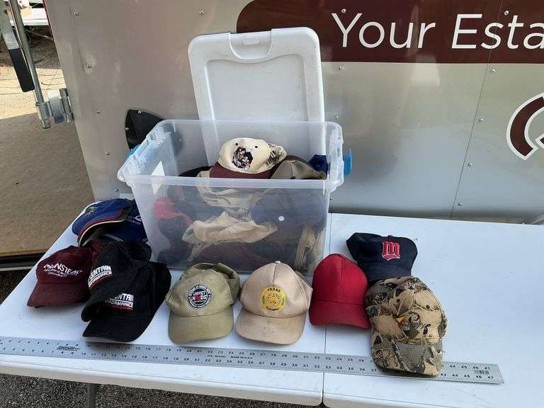 Tote of hats, some need cleaning.