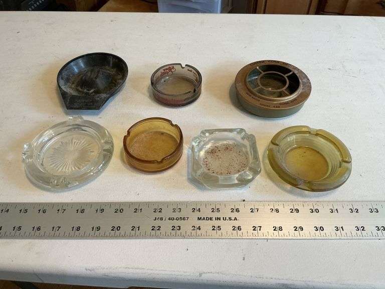 Ashtrays, some advertising.