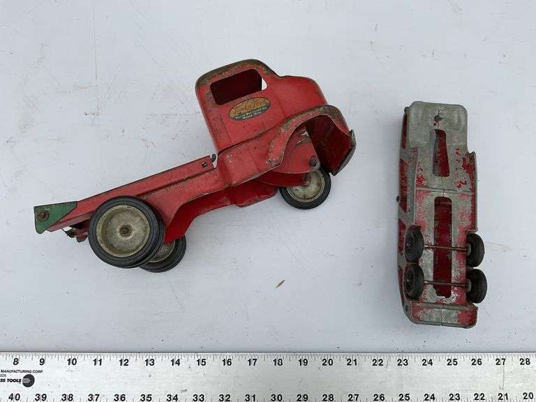 Vintage Tonka truck and Hubley transport trailer