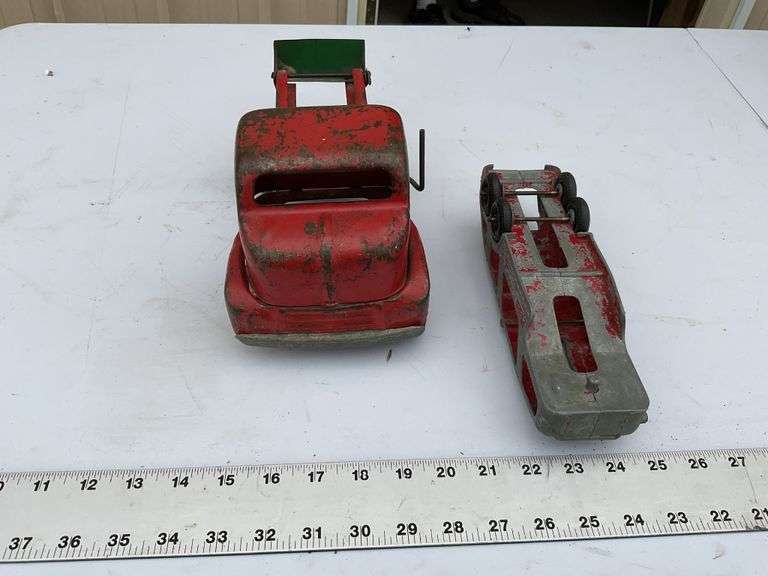 Vintage Tonka truck and Hubley transport trailer