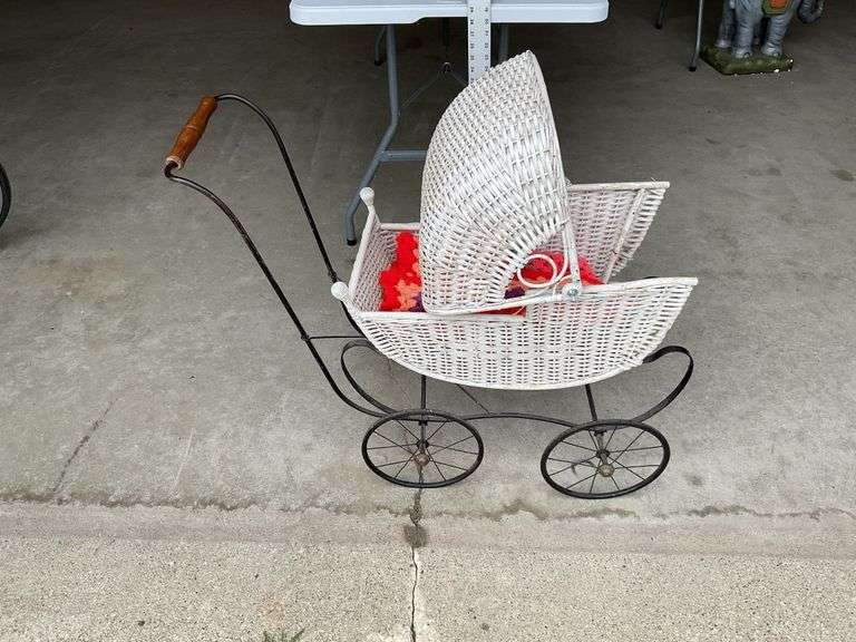 Antique wicker doll buggy