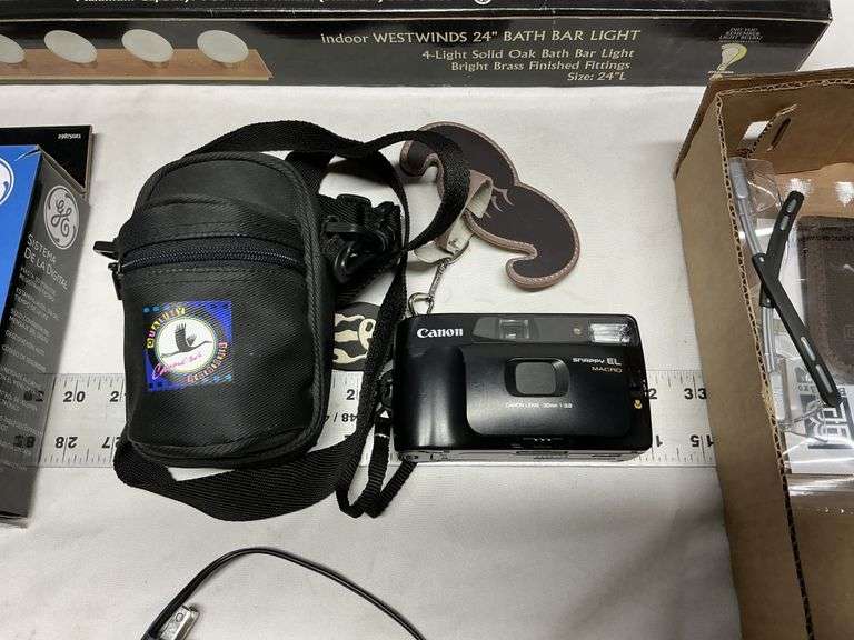 Binoculars/camera/sunglasses