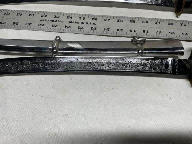 (2) heavy decorative swords