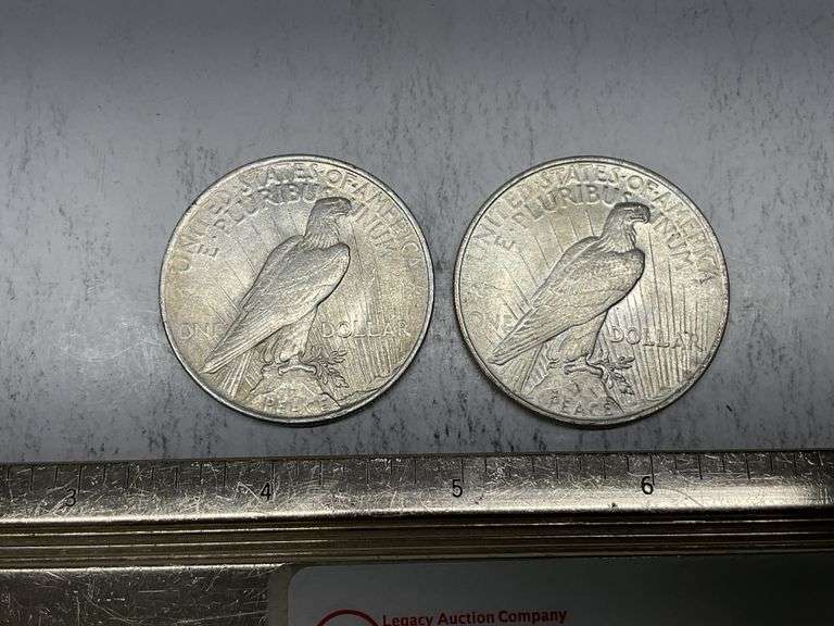 2- 1923 Peace silver dollars