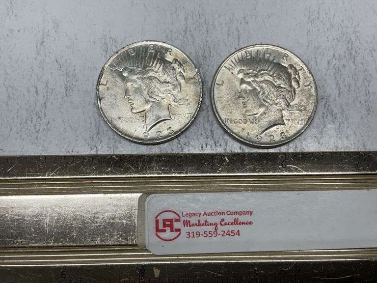 2- 1923 Peace silver dollars