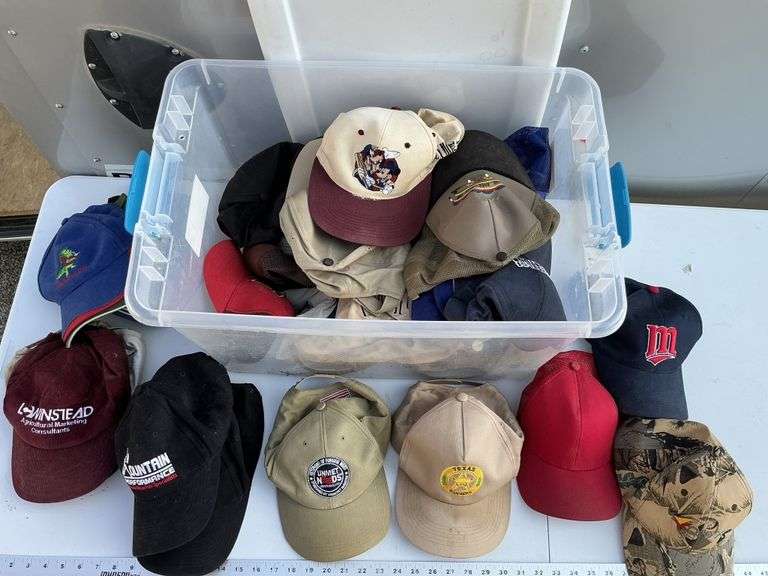 Tote of hats, some need cleaning.