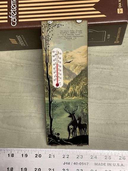 Tripoli Implement Co. advertising thermometer