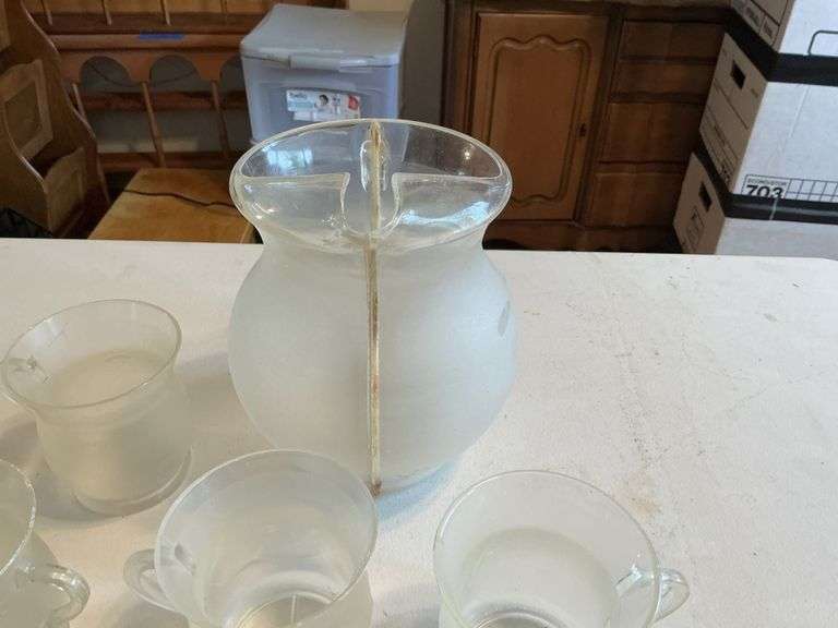 Plastic Kool-Aid pitcher and mugs