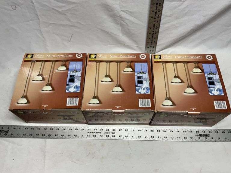 Three boxes of mini pendant light fixtures