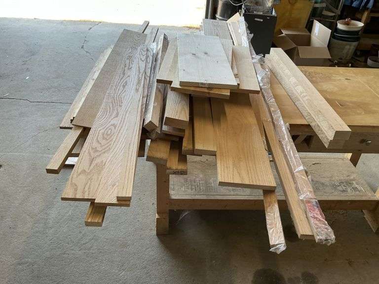 Assorted oak etc wood on table and in totes