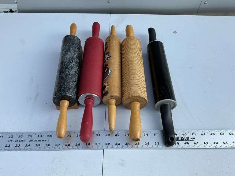 Rolling pins, one marble.