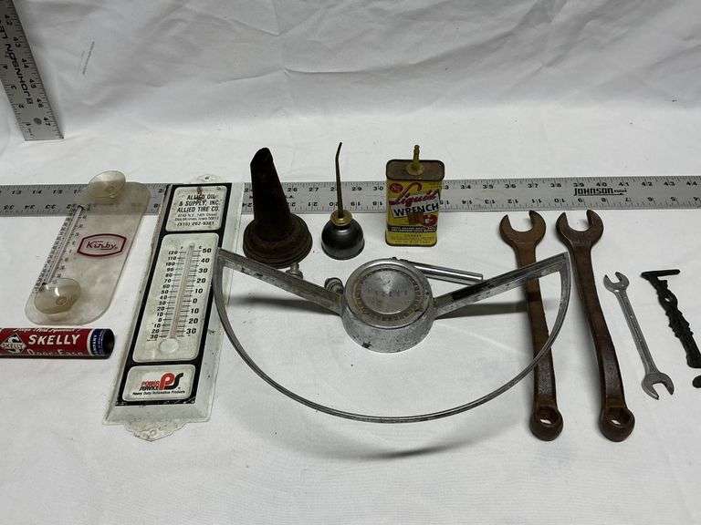 Steering wheel, thermometers, oil cans, wrenches