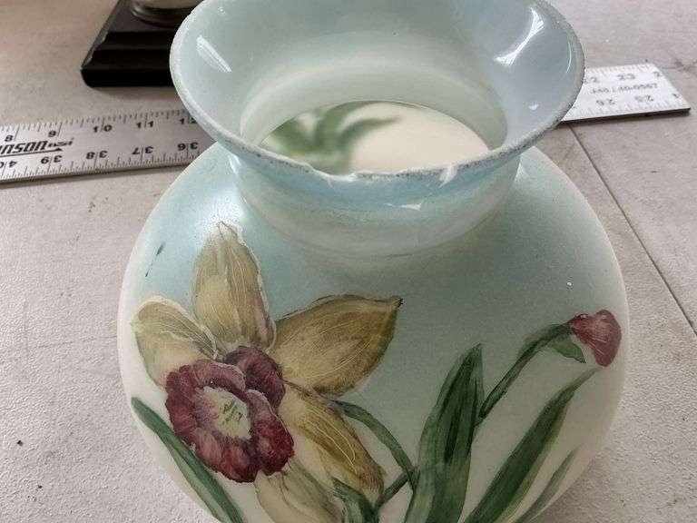 Vintage oil lamp-shade is chipped