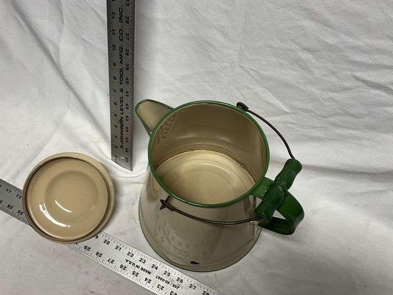Cream and green enamel coffee pot