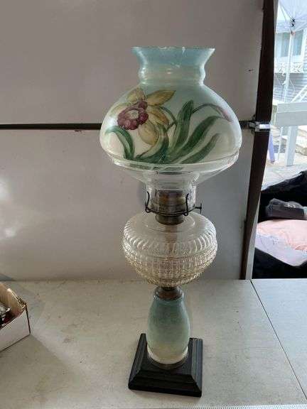 Vintage oil lamp-shade is chipped