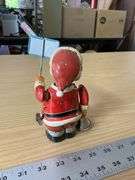 Vintage metal wind up Santa