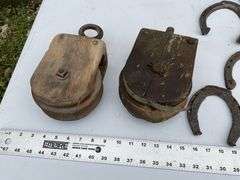 2- wooden pulleys and vintage horseshoes